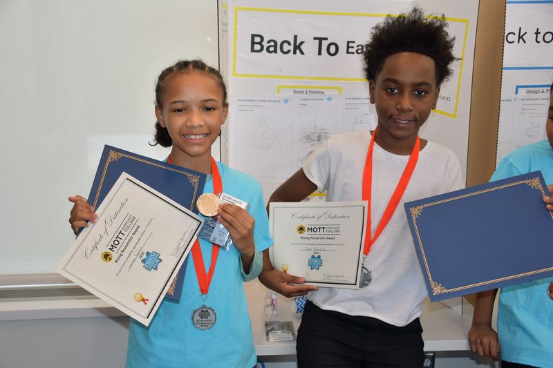 Brownell STEM Academy scholars show off their STEM projects and awards from the Elementary Flint Regional Science and Engineering Fair