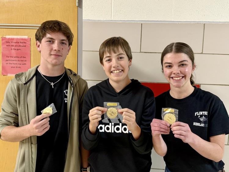 Scholars Bowl team with gold medals