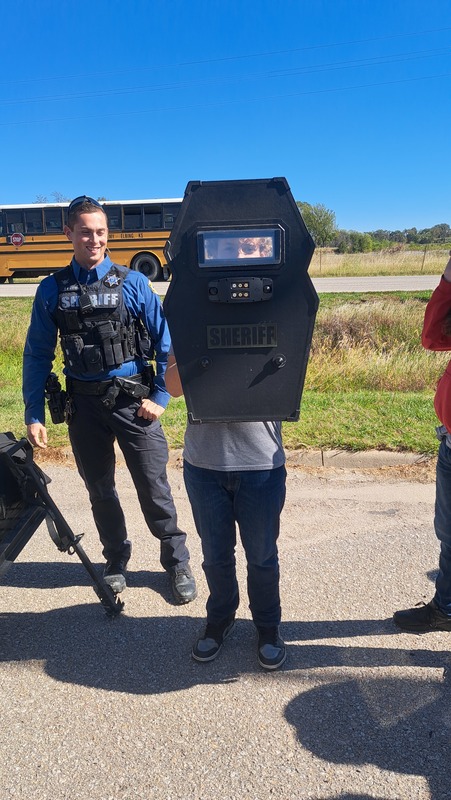 Shawn K with Riot Shield