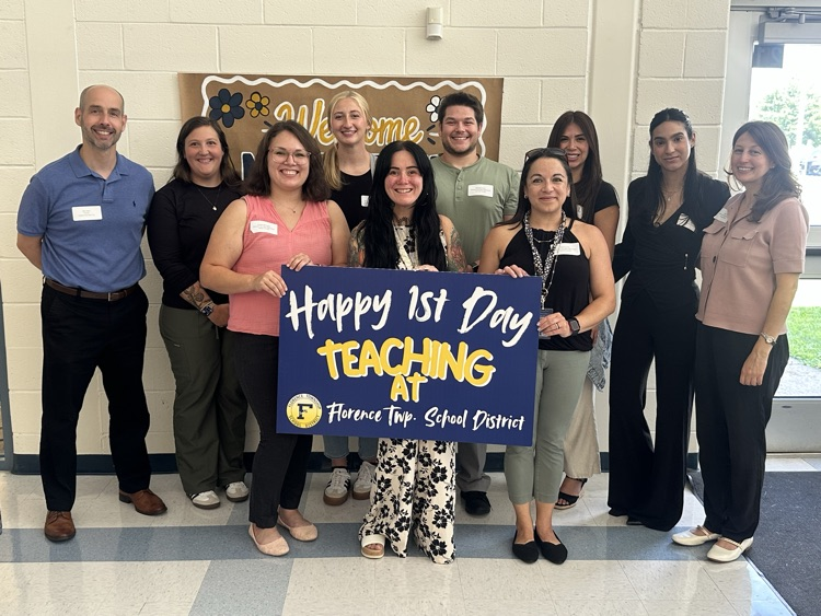 Picture of high school school with new staff and admin