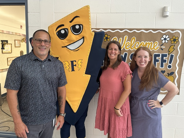 Picture of Riverfront admin with Fred the flash