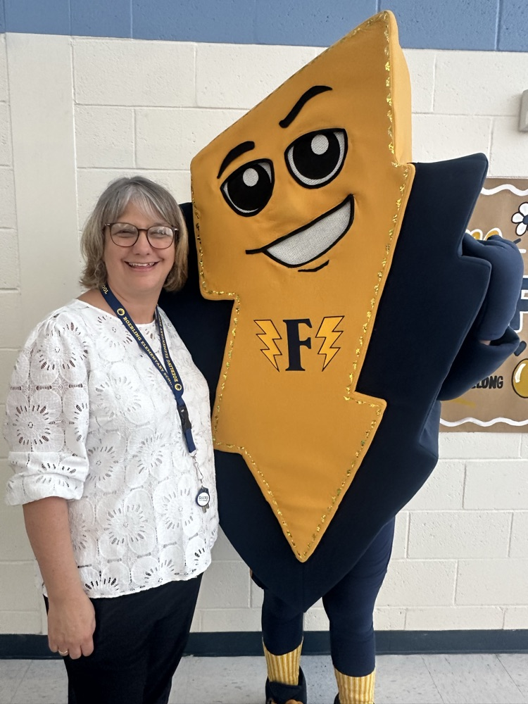 Picture of Roebling admin with Fred the flash