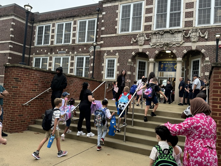 students walking into Roebling school