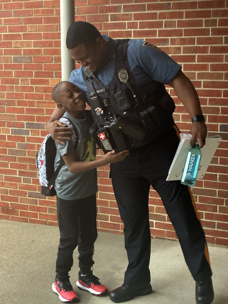 SRO hugging student
