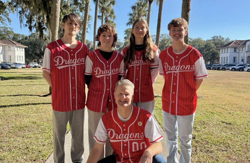 FSDB Academic Bowl Team 2025-26 wearing red and white pinstripe jerseys with Dragons across the chest.