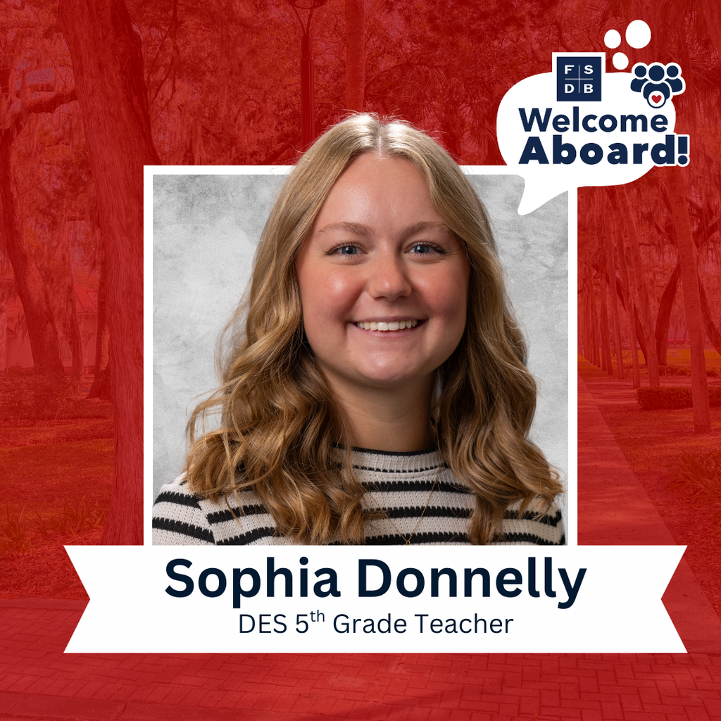 Sophia is wearing a white and black shirt smiling for her photo with a silver backdrop and red background. Below the photo says "Sophia Donnelly, DES 5th Grade Teacher"