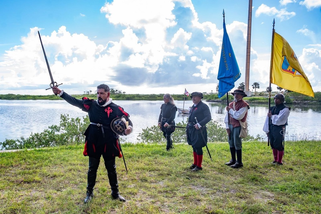 Founders Day members dressed in period clothing  reenacting the landing at the Mission  Grounds