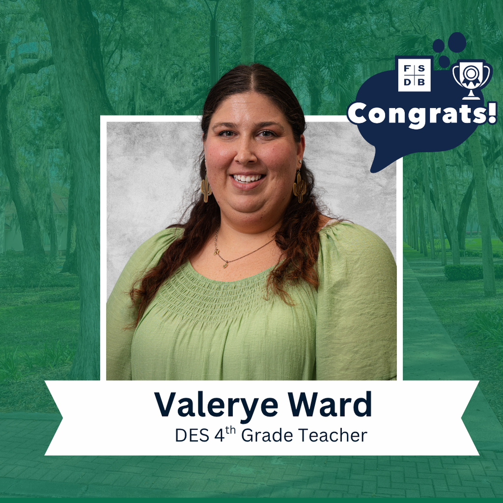 Valerye is wearing an olive green shirt smiling for her photo with a silver backdrop and green background. Below the photo is a white textbox that says "DES 4th Grade Teacher"