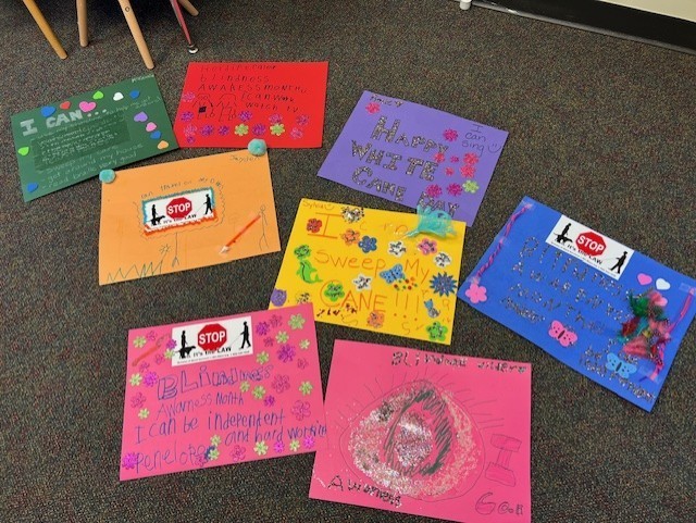 Seven colorful poster created by students to celebrate White Cane Day.