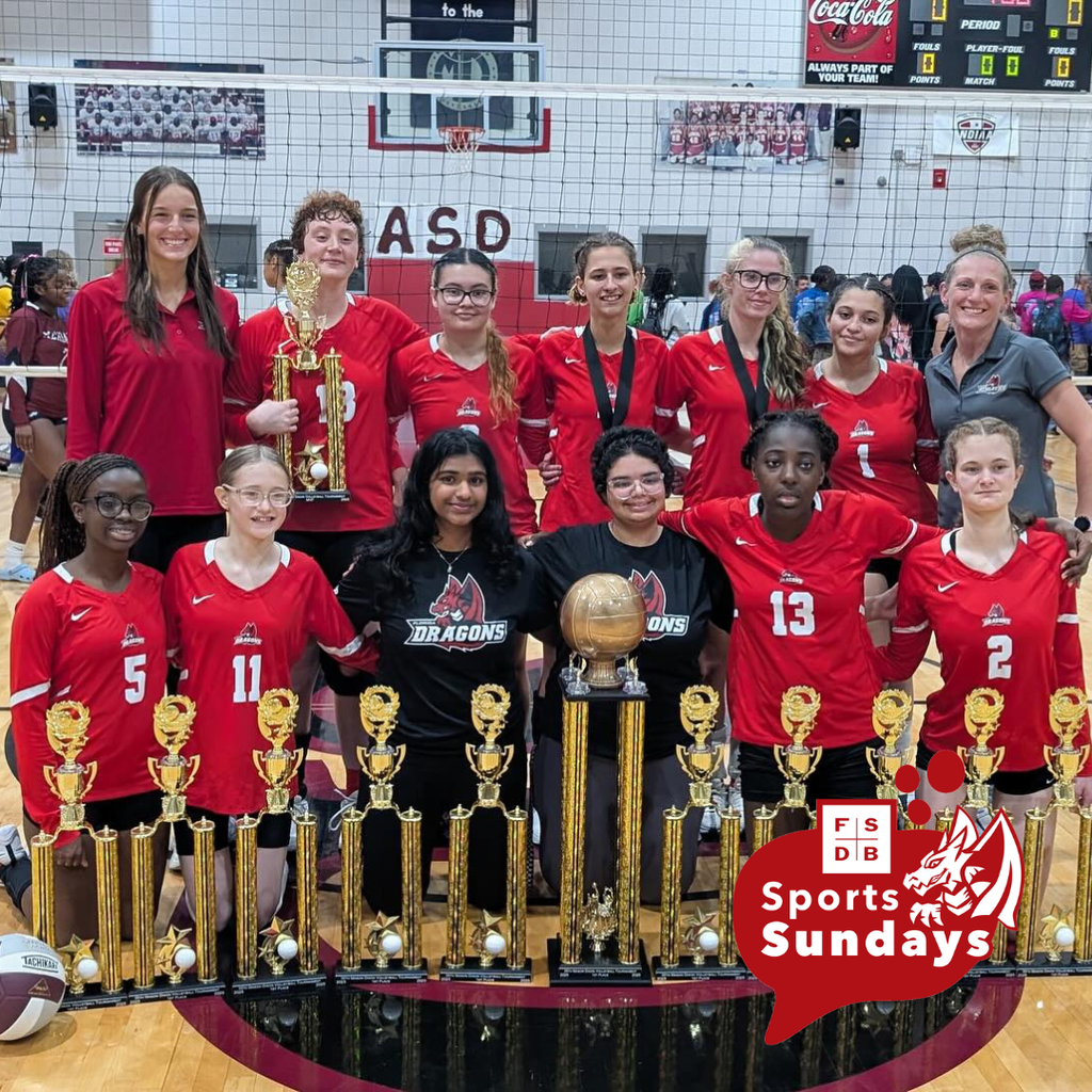 The FSDB Volleyball team smiling with their trophies inside Alabama School for the Deaf gym.