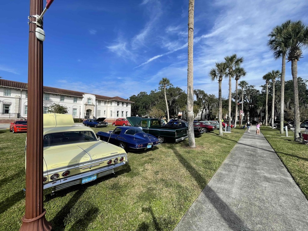 Rows of vintage cars lined up for a car show on the FSDB campus in Palm Row.