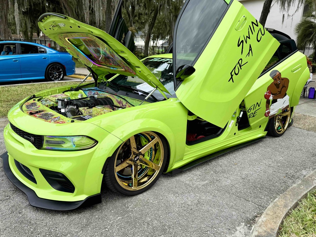 A lime green car parked on the FSDB campus in Palm Row.