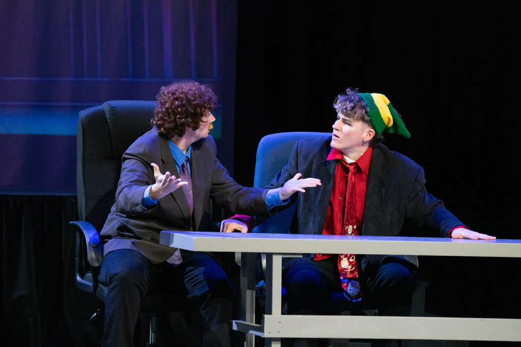 Buddy the Elf annoying his dad in his office on stage in Kirk.