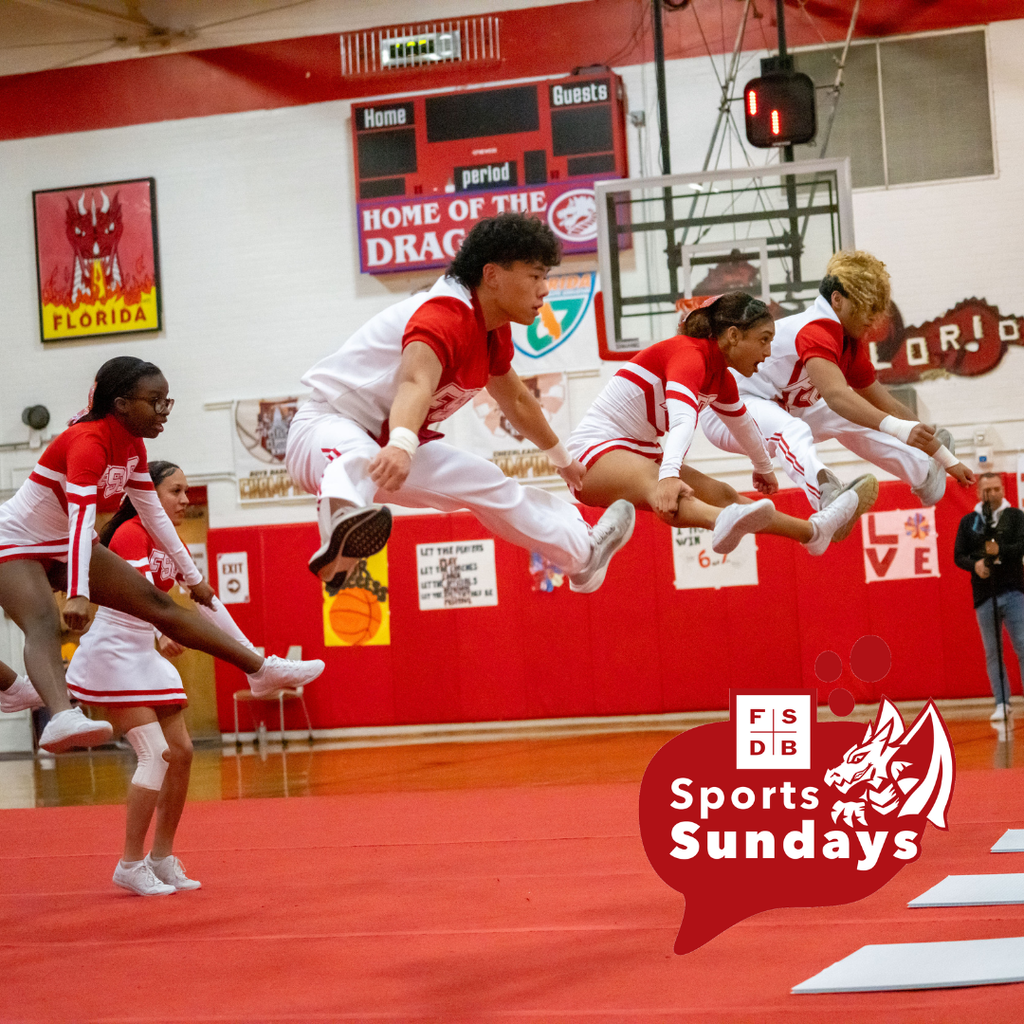 FSDB Cheerleaders do a toe touch on the cheer mat inside Settles Gym.