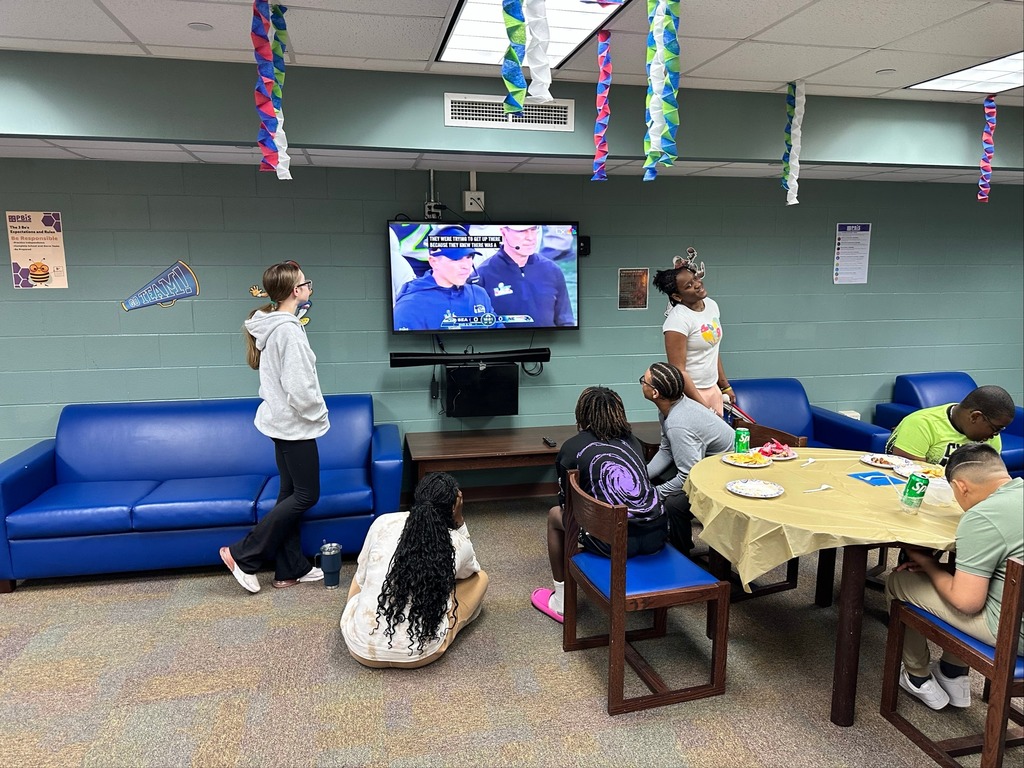 Blind dorm students watch the superbowl inside the dorms.
