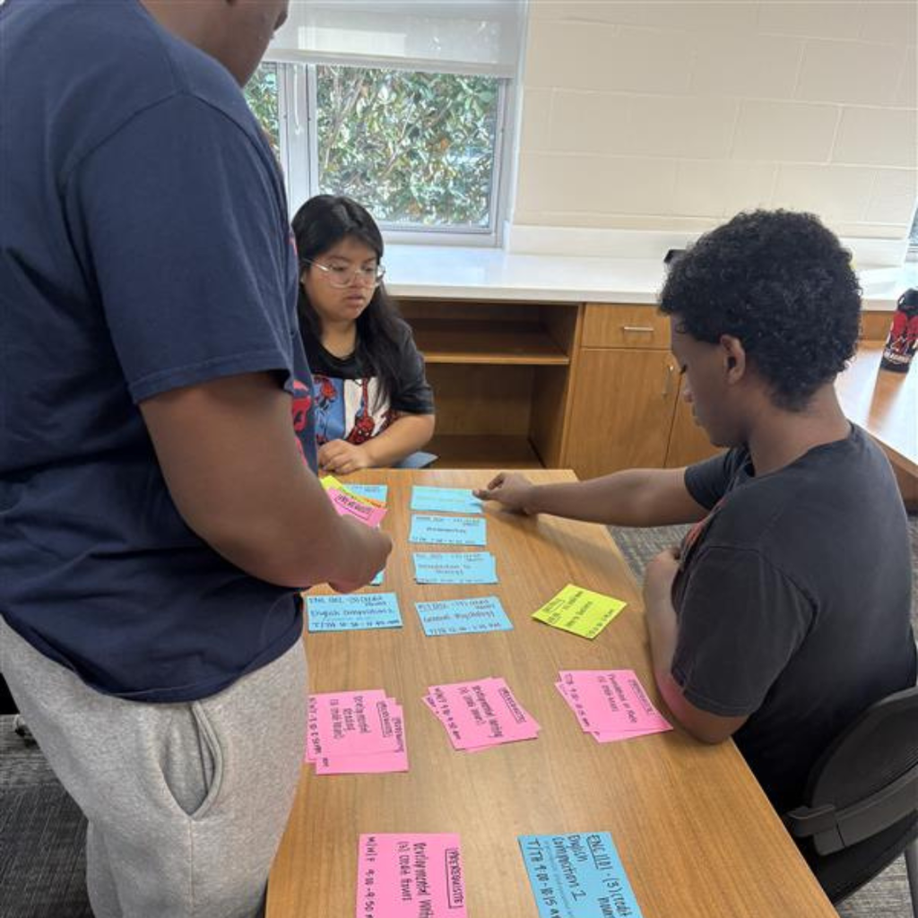 Students working together to set up their sample college classes.