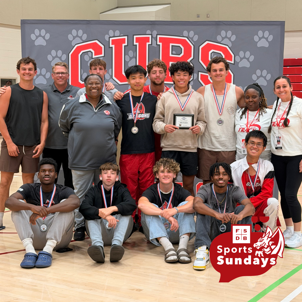 FSDB Boys Track & Field team smile for a group photo inside the CSDR gym.