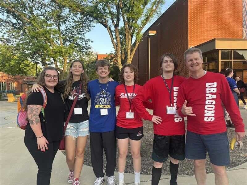 FSDB Academic Bowl team and staff smile for a photo outside of Gallaudet University. 