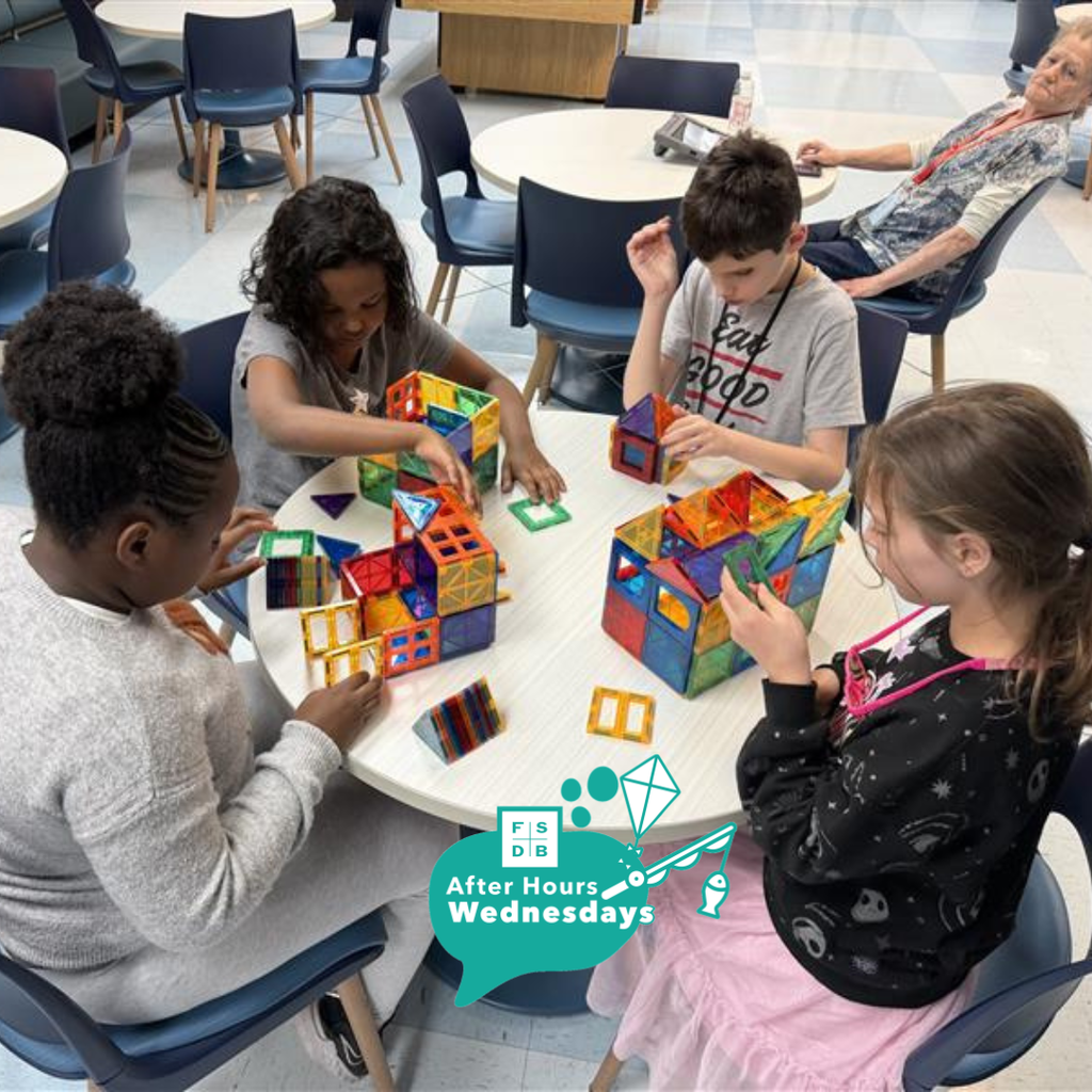 Group of BMS students building blocks inside the Cobras Corner. 
