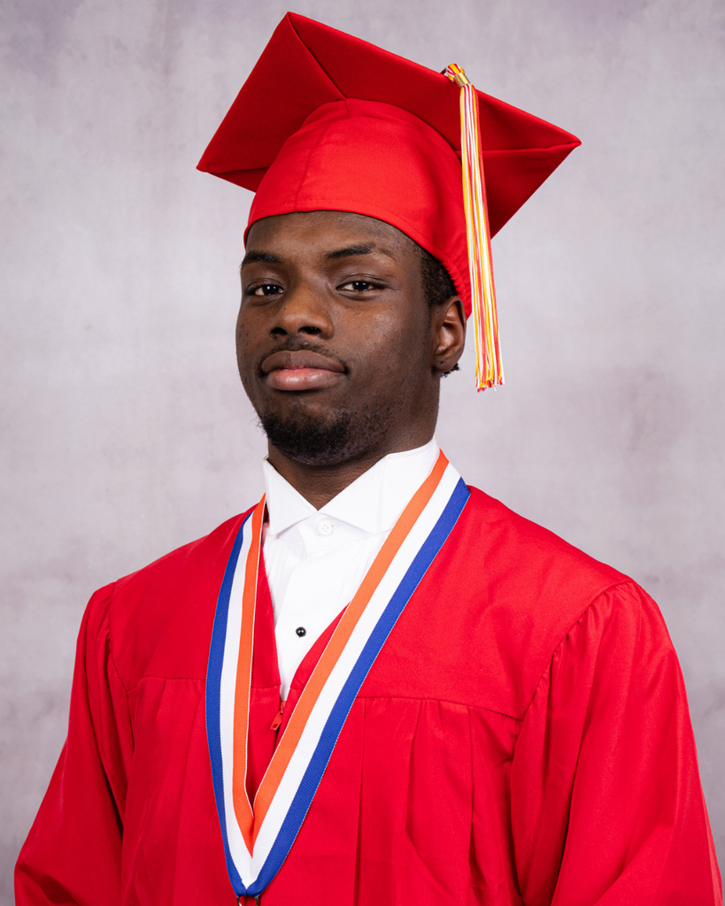 Edward smiles for his photo wearing his red cap and gown. 