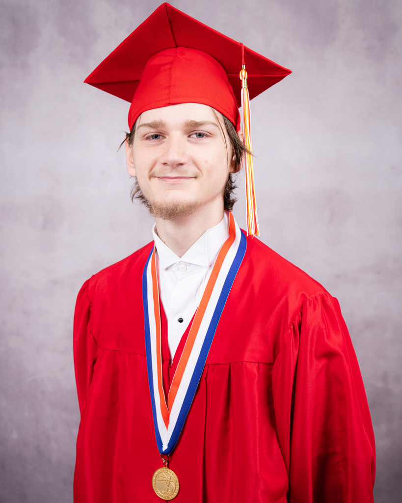 Bryce smiles for his photo wearing his red cap and gown. 