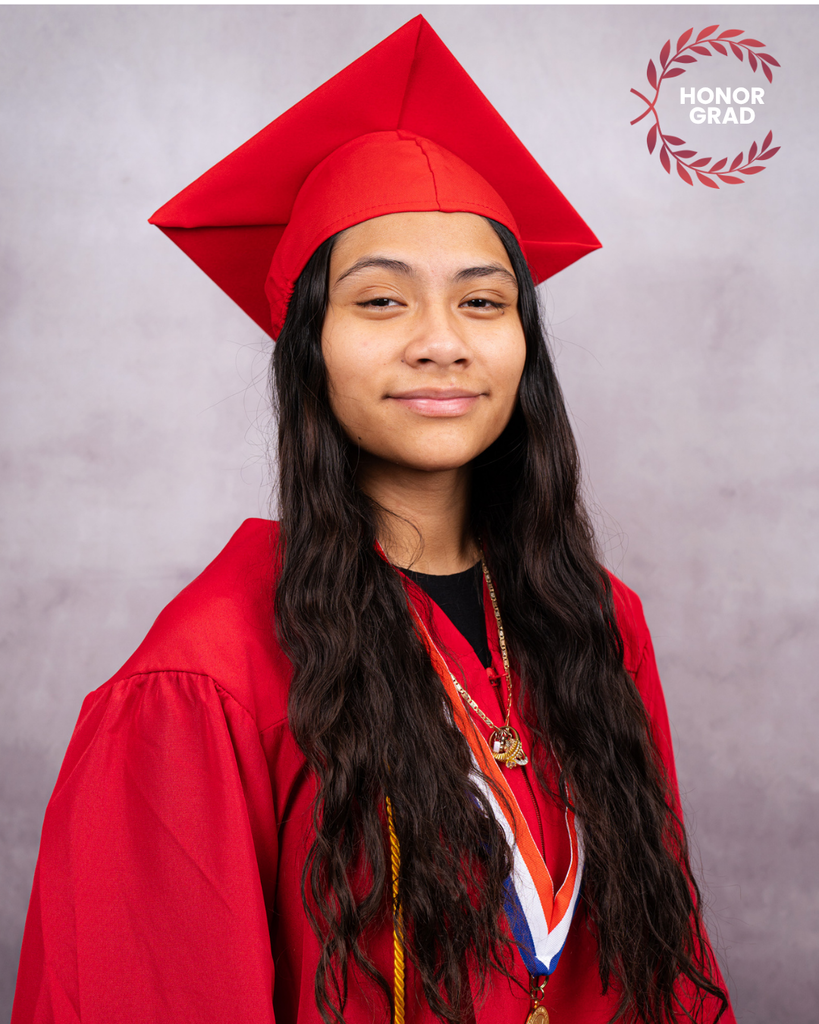 Meilyn smiles for her photo wearing her cap and gown, with a "Honor Grad" logo on the top right corner.