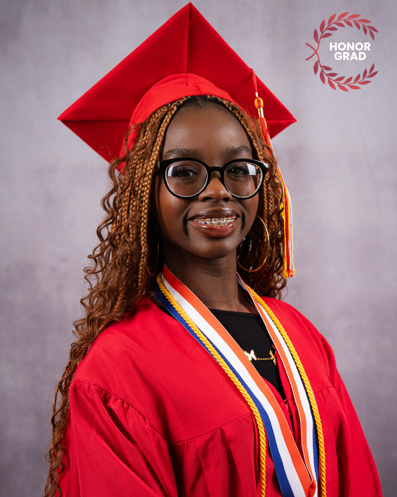 Megan smiles for her photo wearing her red cap and gown, and a "Honor Grad" logo on the top right corner. 