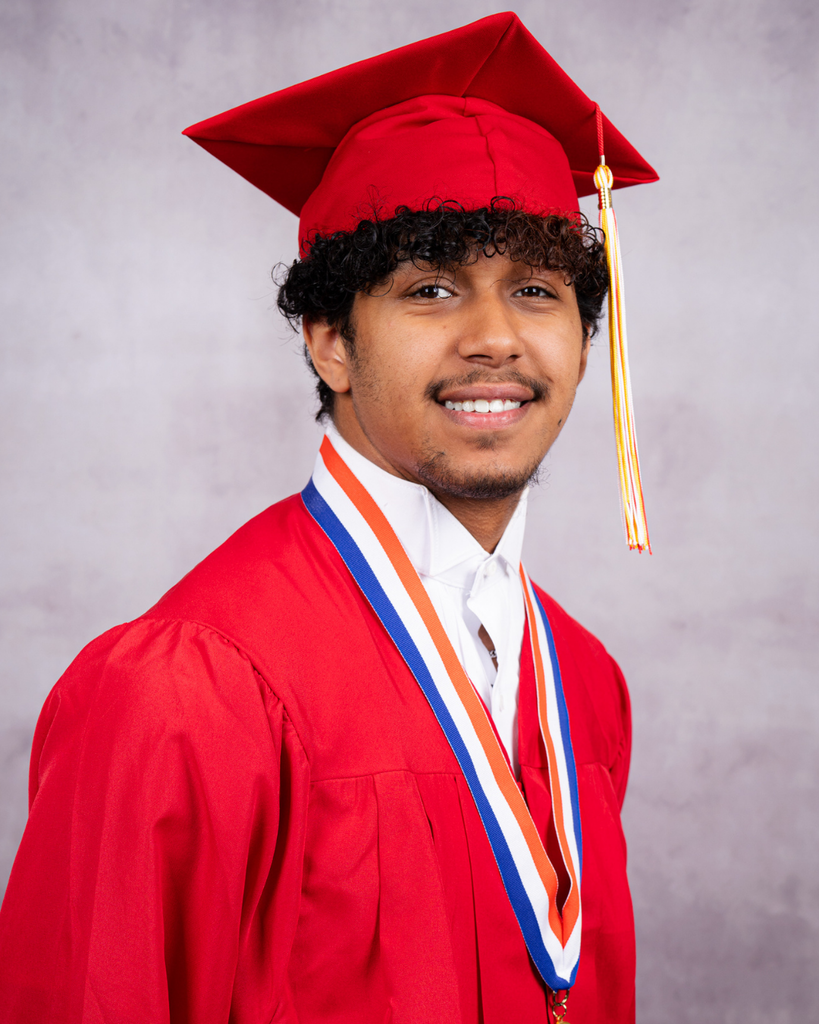 Robert smiles for his photo wearing his red cap and gown.