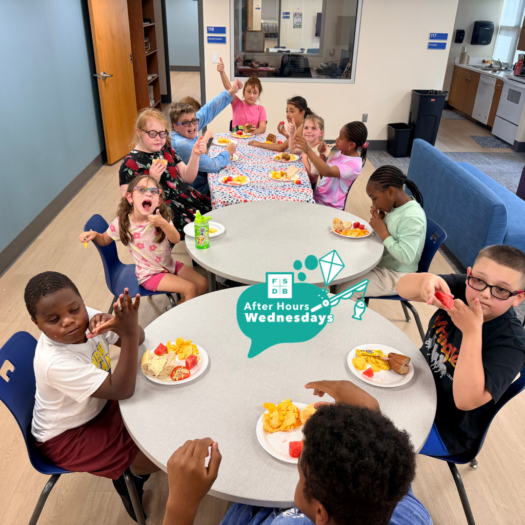 A group of students earring snacks inside Kramer.