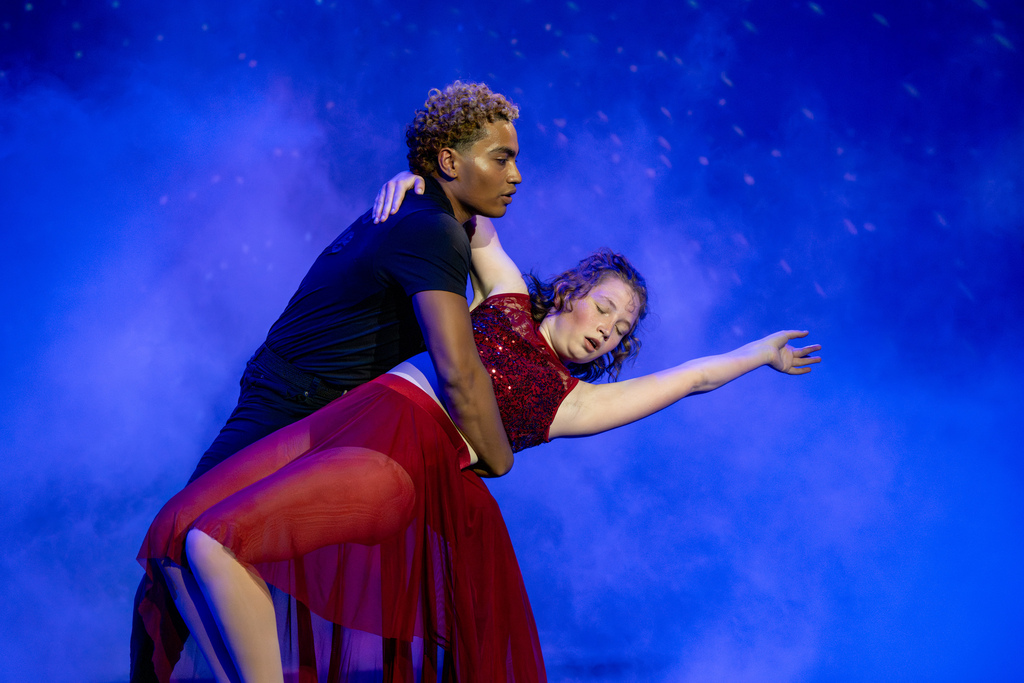 Two students perform a duet on stage in Kirk. 