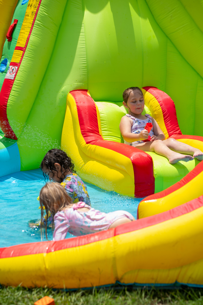 ELC students play in the water slide area. 