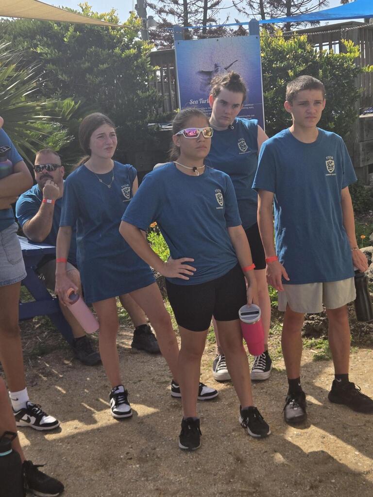 Students looking at exhibits at Marine Land. 