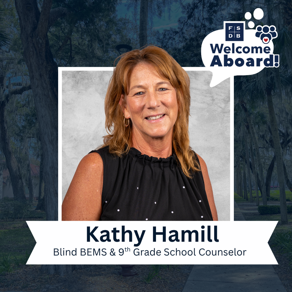 Kathy is wearing a black with white dots on her shirt smiles for her photo with  a silver backdrop and blue background. Below her photo is a white graphic with text that says " Kathy Hamill, Blind BEMS & 9th Grade School Counselor"