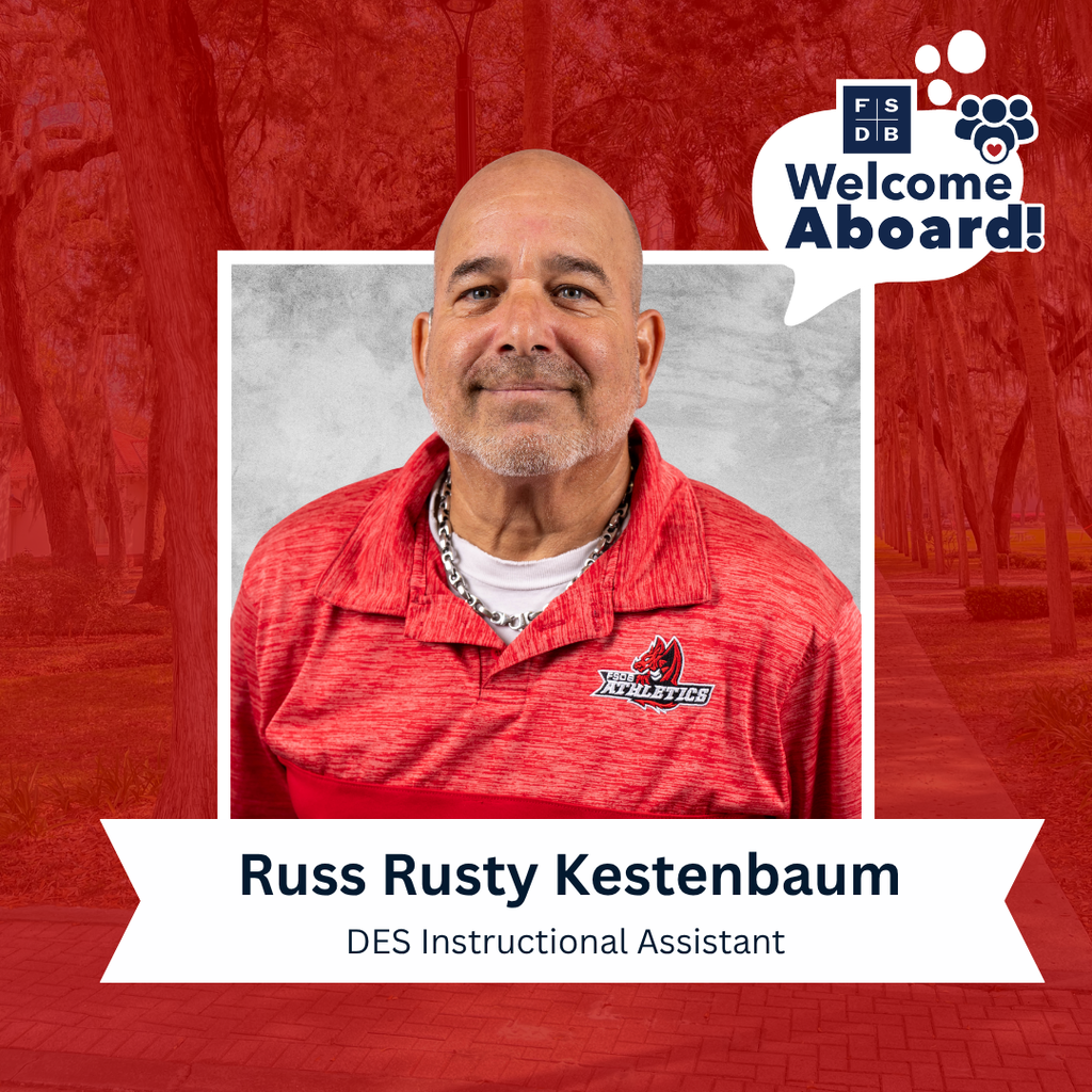 Russ wears a red FSDB athletics polo shirt smiles for his photo with a silver backdrop and red background. Below his photo is a white graphic with text that says "Russ Rusty Kestenbaum, DES Instructional Assistant" 