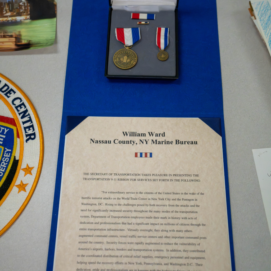 A letter and medals for Mr. Ward from Department of Transportation. 
