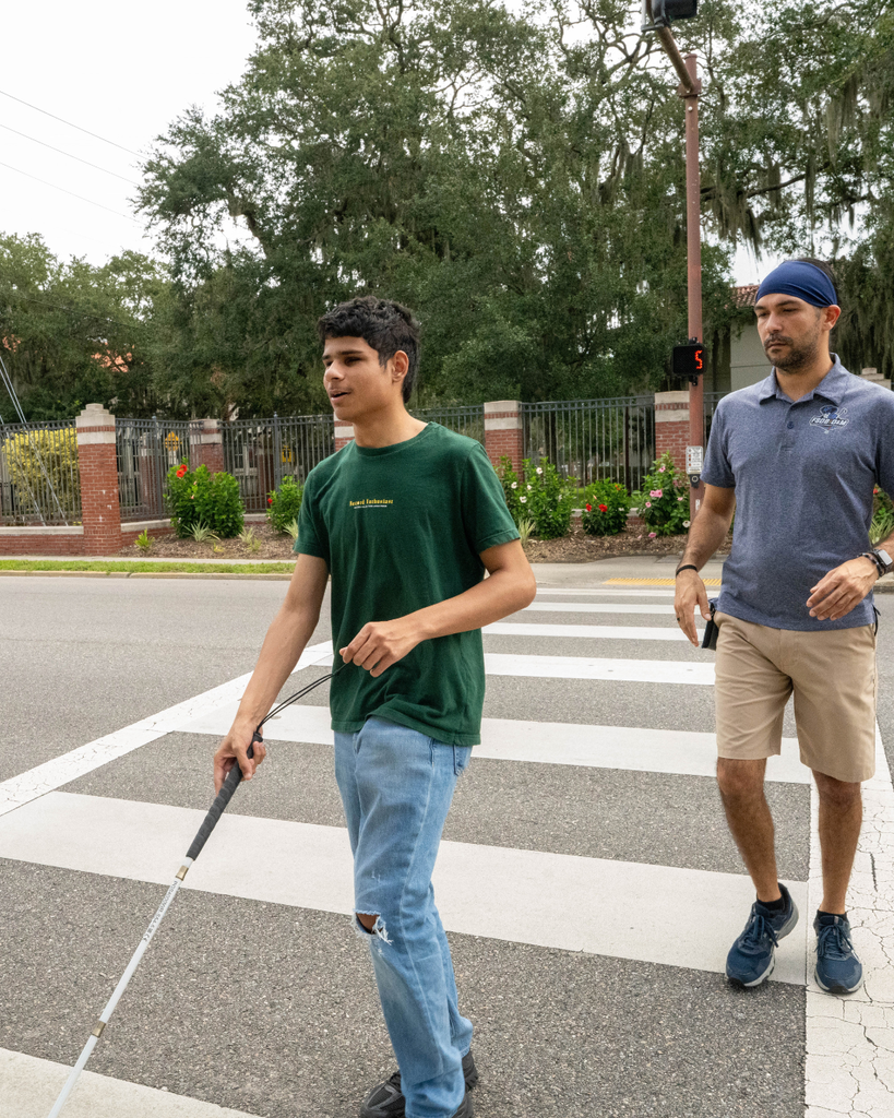 Marco and Carlos walk across the street together.