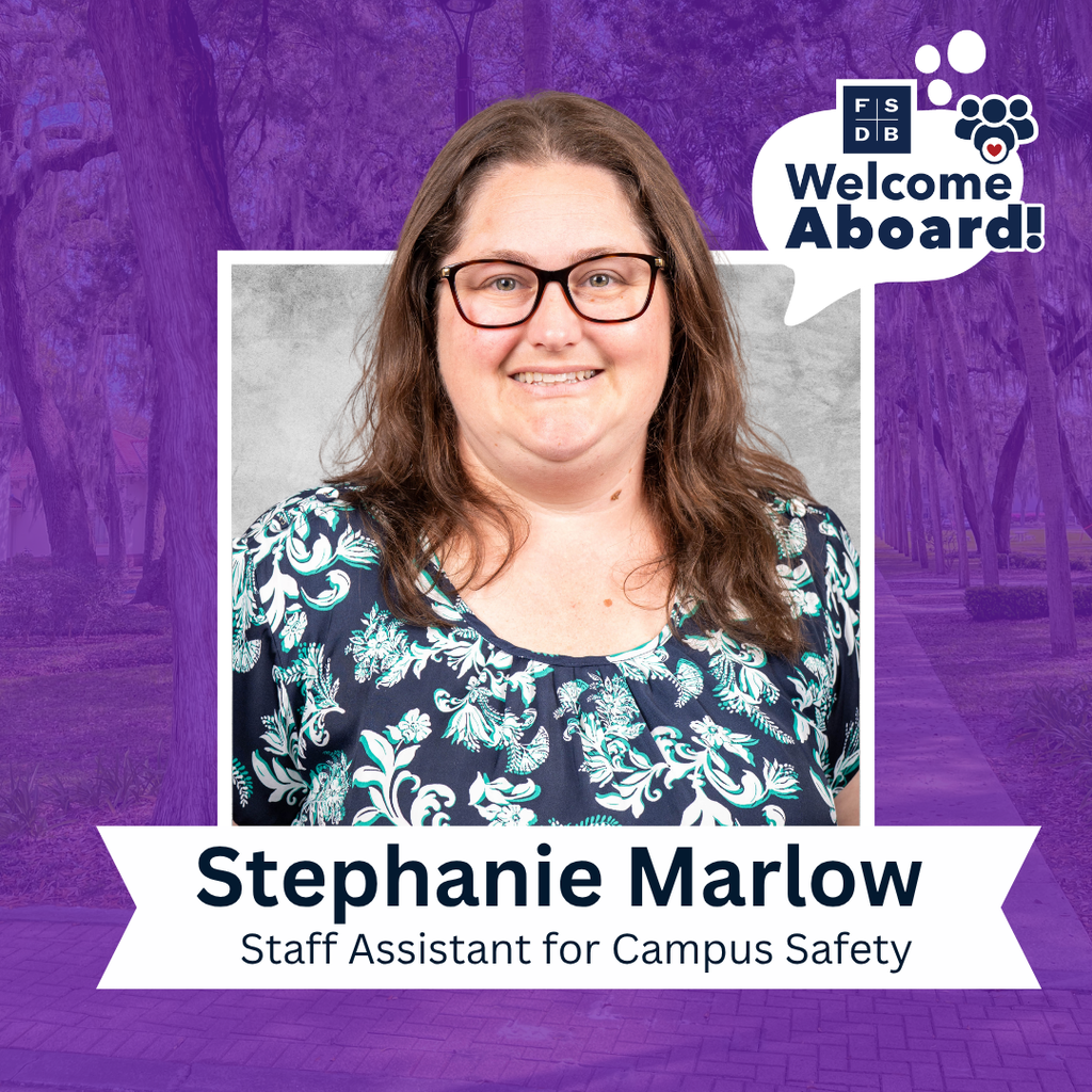 Stephanie is wearing a blue scattered flower shirt smiles for her photo with a silver backdrop and purple background. Below her photo is a white graphic with text that says "Stephanie Marlow, Staff Assistant for Campus Safety"