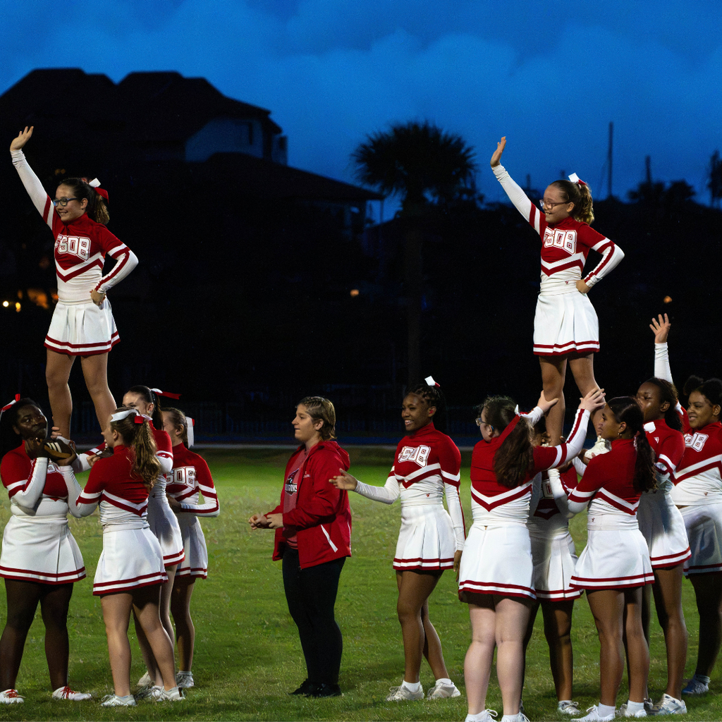 FSDB cheerleaders perform on the field during half time. 
