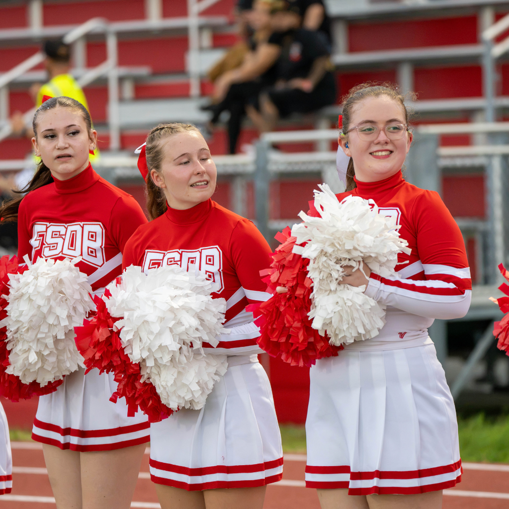 FSDB cheerleaders smile on the sideline.