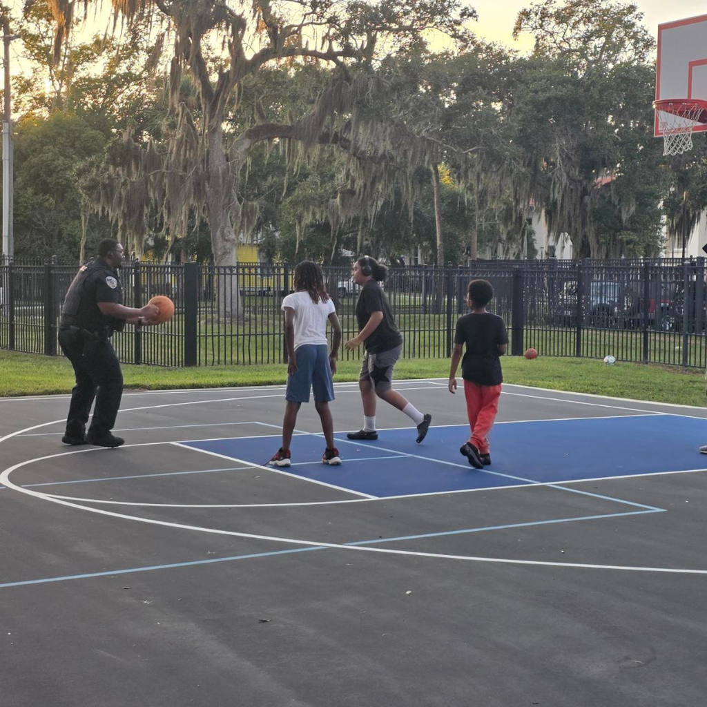 FSDB Police play basketball with the dorm students. 