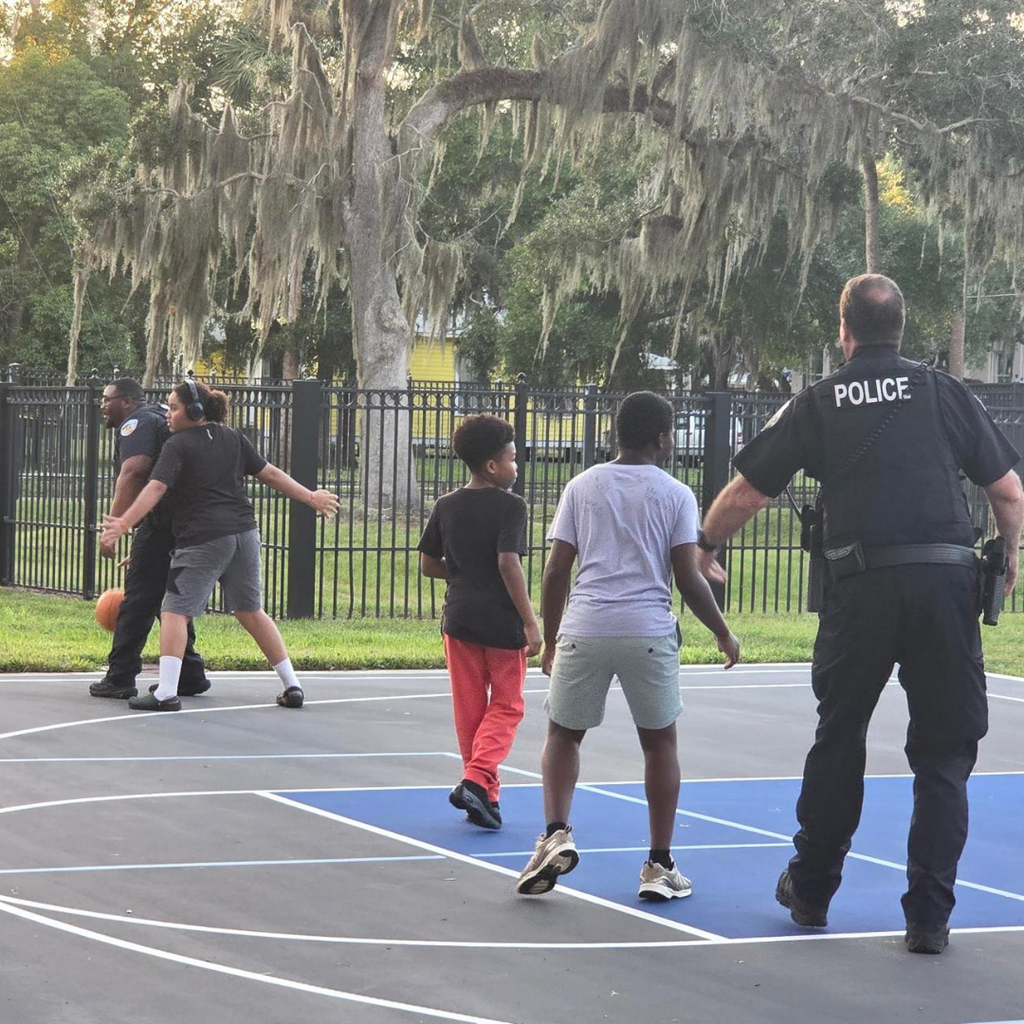 FSDB police play basketball with the dorm students. 