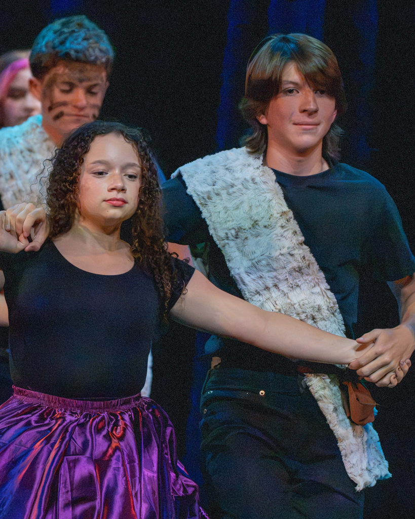 Dance Troupe partner couple dance together on stage in Kirk.