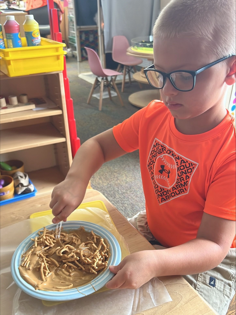 Ryker is making haystacks. 