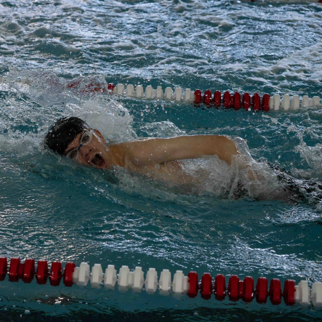 FSDB swimmer swims in the water. 