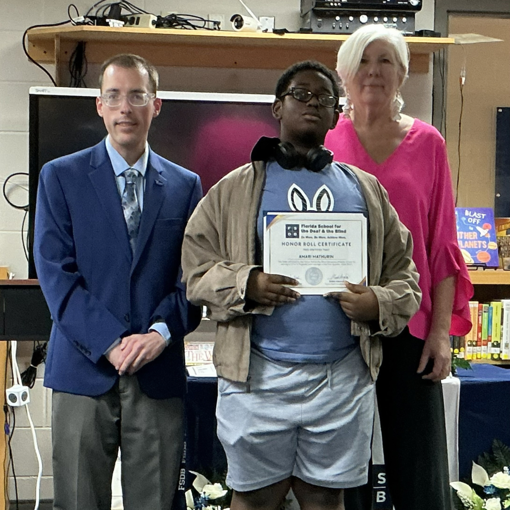 Images show various photos from the ceremony, including a cake which reads “Congratulations BMS Honor Roll” and award recipients holding their certificates.