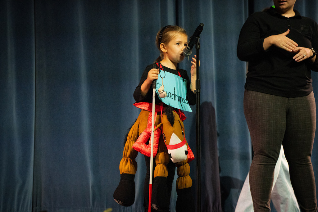 A girl dressed like a horse.