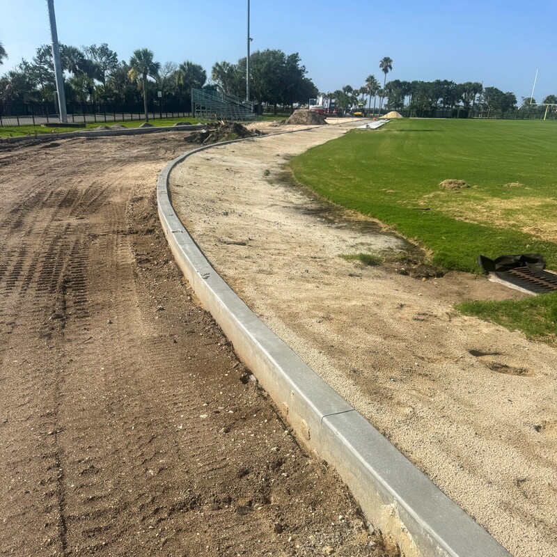 Northwest turn of the track being built with concrete sides.