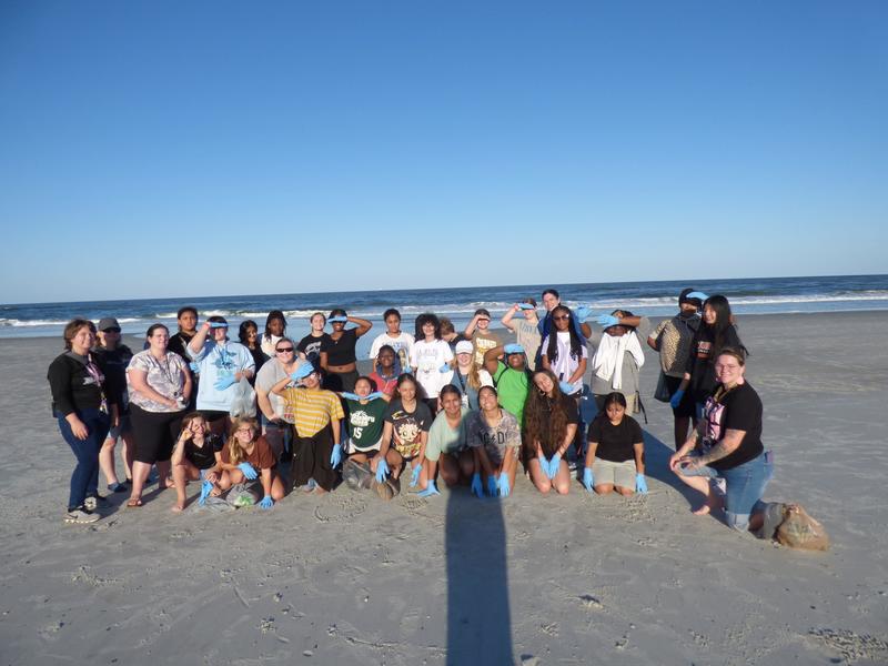 Group picture at the beach.