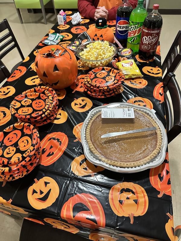 Table of halloween food and drinks.