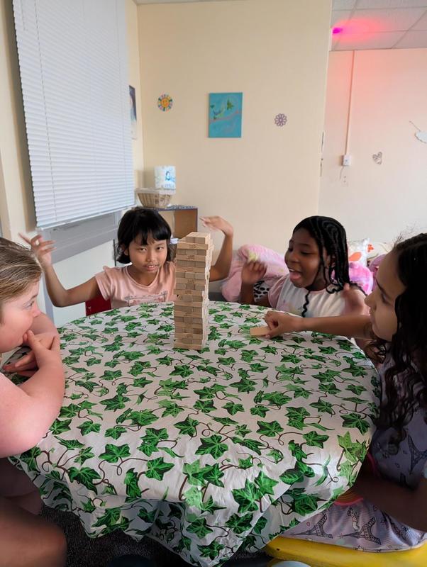 Elementary students playing Jenga